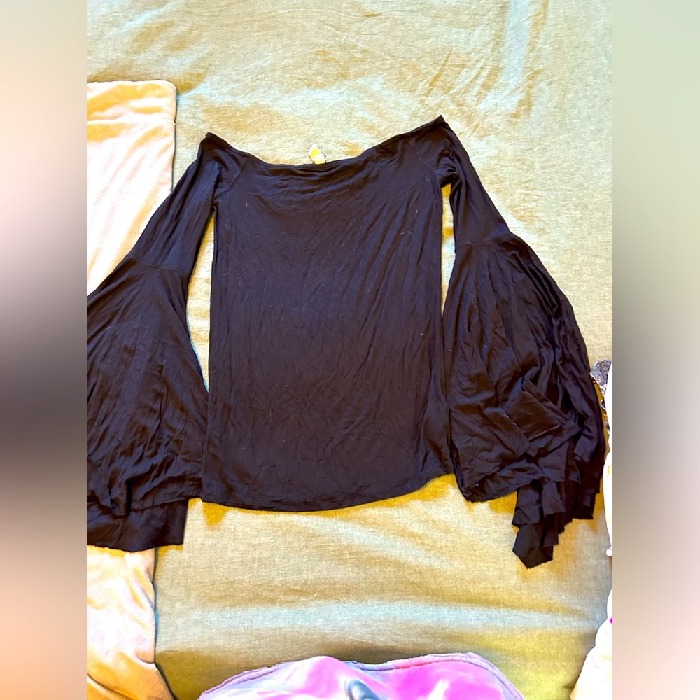 Gently used free people top. Off the shoulder with bell sleeves.